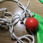 Suzakoo rubber exercise ball attached with rope for striking practice.