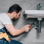 Miami home plumbing system showing signs of corrosion and humidity damage