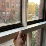 Tight wooden window frame repair in Boston home