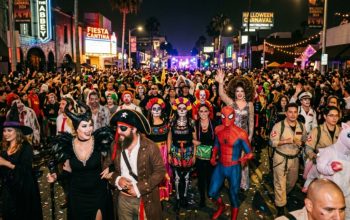 Crowd in costumes at West Hollywood Halloween Carnaval street party