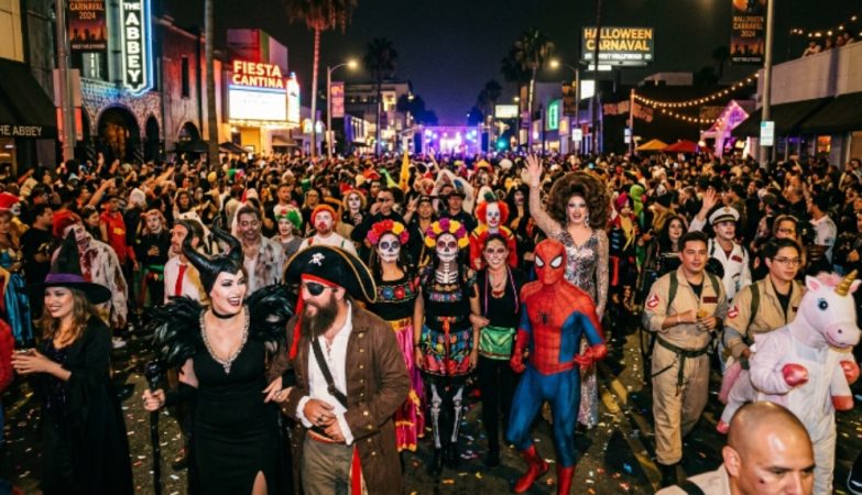 Crowd in costumes at West Hollywood Halloween Carnaval street party
